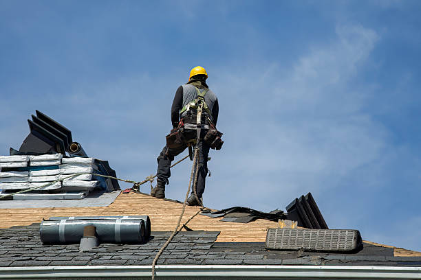 Professional Gutter Installation technician working in Salem, OR